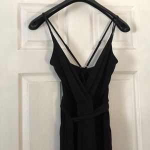 Black Express Jumpsuit with leg slits -Size M